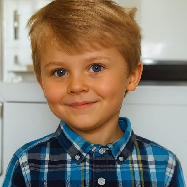 Restored photo of a Young boy wearing a blue plaid shirt in a kitchen setting